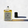 Front angle of Entrada 15ml roller botanical natural parfum with lid off.